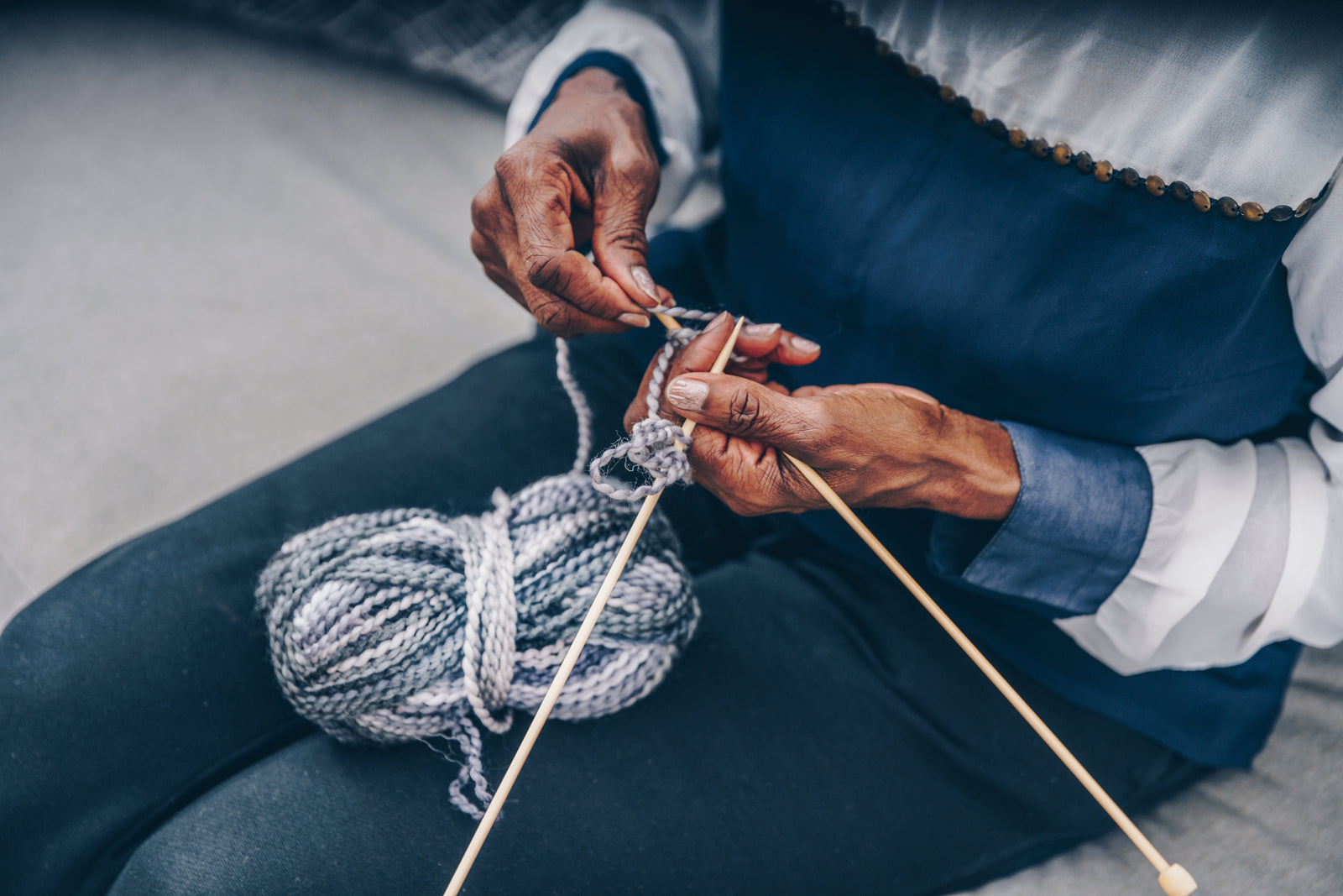 Senior citizen knitting